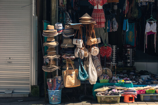 A souvenir kiosk in Ubud. The merchandise is displayed in front of the kiosk. March 6, 2026, Bali, Indonesia