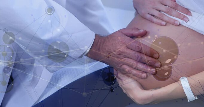 Male clinician placing hands, palpating female patient abdomen for diagnosis, network overlaying