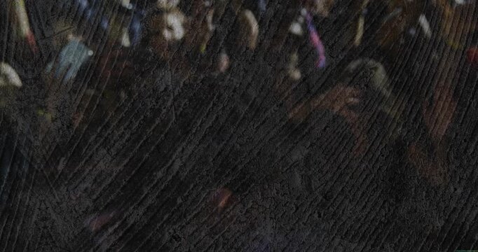 Attendees raising lit phones and swaying in concert, music starting, blue cap appearing in overlay