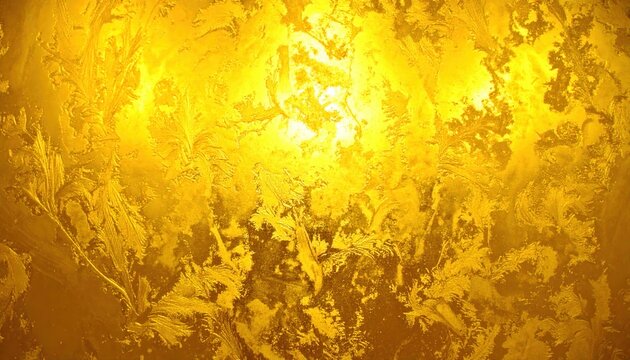 Abstrakcyjna, luksusowa, złota tekstura tła z efektem metalicznym i nieregularnymi plamami światła.
