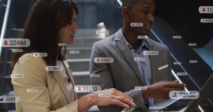 Woman placing hand on reader, man typing laptop, HUD notifications multiplying for business access