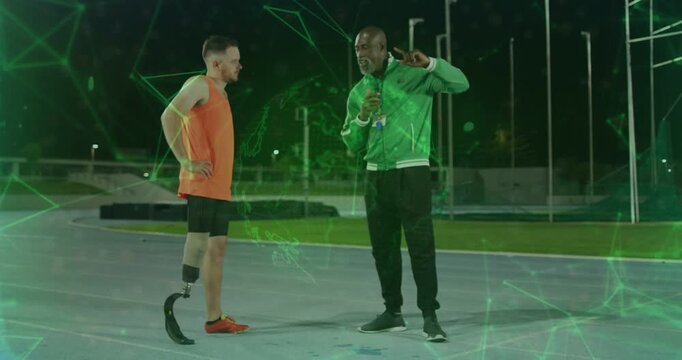 Coach tapping, cueing athlete testing blade and striding, training, green overlay around blade