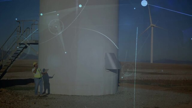 Answering radio, tech in hardhat vest, checking tower base with tablet and overlays, copy space