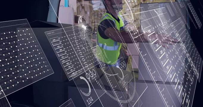 Male warehouse worker responding to tablet prompt, scanning boxes and updating HUD inventory data