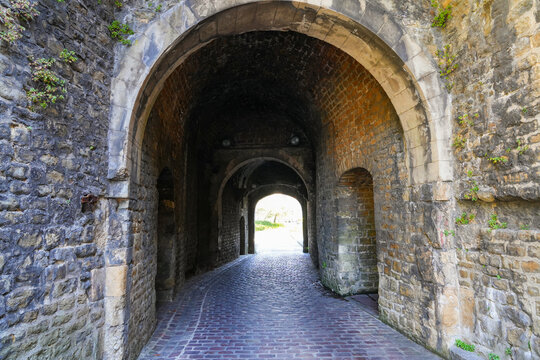 Interior view of a medieval vaulted chamber within the fortified walls of Boulogne-sur-Mer, France