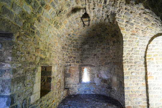 Interior view of a medieval vaulted chamber within the fortified walls of Boulogne-sur-Mer, France