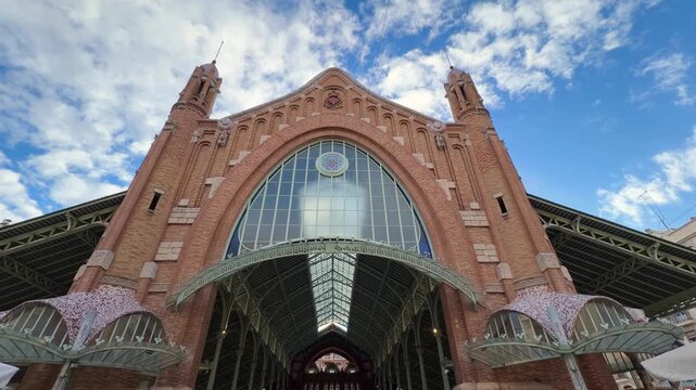 Landscape view of Mercado de Col&oacute;n building facade and blue sky