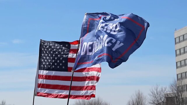  Defend democracy flag flying at the No Kings Rally in Minnesota