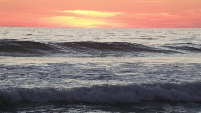 Sunset Reflections Over The Waves on Grandview Surf Beach, Encinitas, California, USA