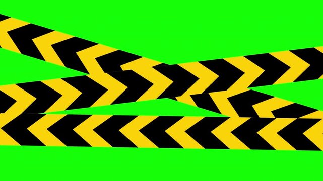 Caution tape lies on green ground
