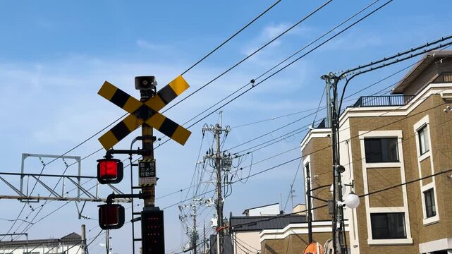 Railway Crossing Signal with Flashing Red Lights in Kyoto Japan