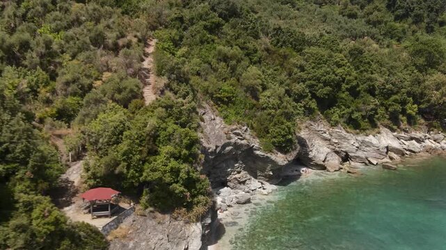 Majestic aerial view flying over the stunning Agios Ioannis beach on the pelion peninsula in greece