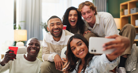 Obraz premium Happy people, friends and memory with selfie in home for live soccer game, match or social together. Excited, group or sport fans with smile for photography, picture or fun entertainment in house