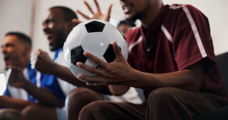 Hands, friends and celebration with football in home on couch, cheers and fist pump for goal in...