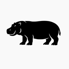 Obraz premium A simple black silhouette of a smiling hippopotamus standing on land