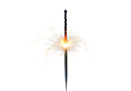 Extreme macro shot of a single, charred metal sparkler intensely burning, showering luminous silver and gold light trails against a transparent copy space, concept of explosive festive energy