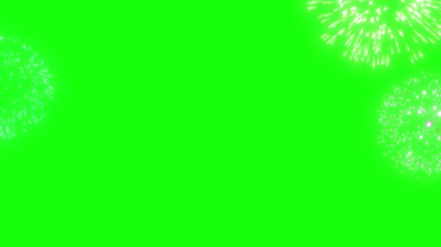 Glowing white fireworks exploding on bright green screen background in motion video clip