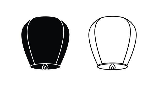 Two sky lanterns one solid black and one outlined a striking silhouette