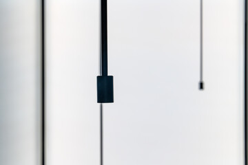 Obraz premium light poles hanging in the exhibition room 