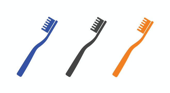 Three colorful toothbrushes in blue, black, and orange arranged in a row for dental hygiene and oral care routines