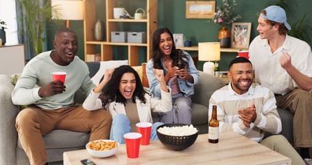 People, celebration and watching tv in living room with sports match, smile and soccer world cup win. Happy, friends and cheer in home with football game, drinks and snacks for championship victory. © peopleimages.com