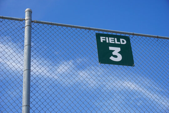 Baseball and softball field 3 sign on fence