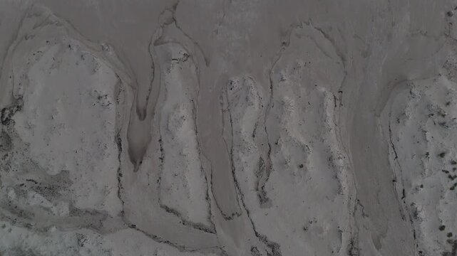 Aerial Beach Coastline South Africa Drone Sweeping Over Rippled Sand And Foamy Waves, Muted Grey Tones, Subtle