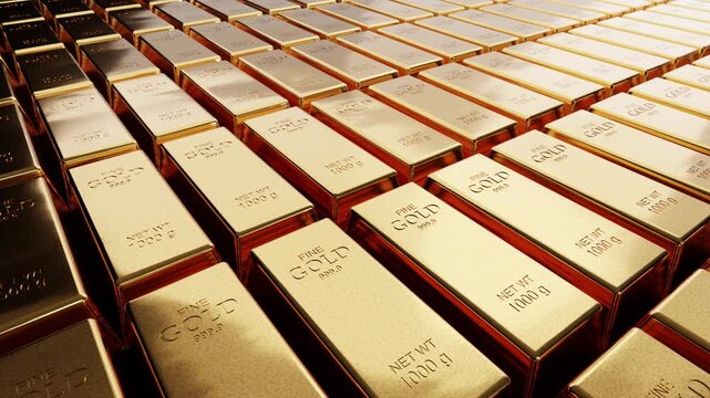Many shiny gold bars 1000g stacked in rows. Concept of wealth, banking investment and financial success.Rows of fine gold 999.9 bullion ingots for store of value and economic growth background