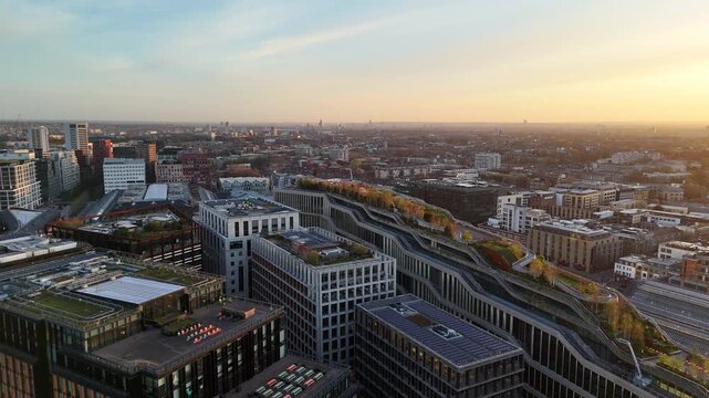 A dawn sunrise aerial view of the city skyline in the London King's Cross district.
