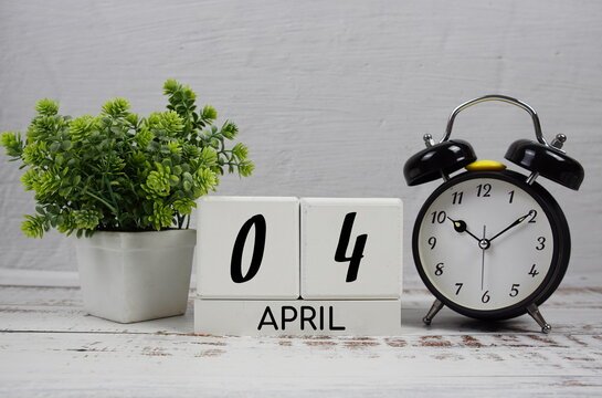 Wooden Calendar Showing the Date of April 4th. Day 4 of April month