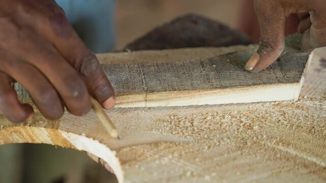 Close up hands shaping wood edge, carpentry rasping on curved plank cabinetmaker filing trim on dusty workbench, tactile grain visible, steady measurement, careful finishing gestures, concentrated