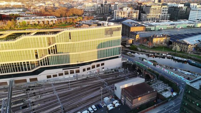 An aerial round view of a massive office building complex next to London King's Cross station.