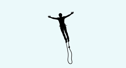 A person with arms outstretched appears to be jumping with a rope silhouette © Mdselim