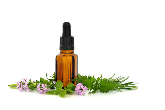 Hay fever and Sneezing Herbal antihistamine treatment for summer hayfever and sneezing with brown tincture bottle on white. Rosemary, nettle, marjoram, oregano, sage, thyme herbs.