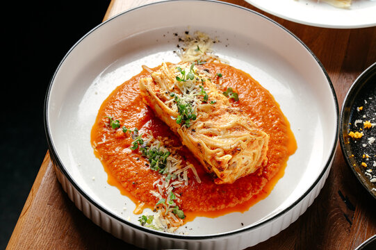 lasagna with sauce and cheese