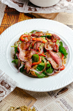 salad with bacon and lettuce leaves