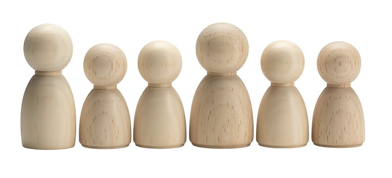 Seven wooden peg dolls in a row wooden figures wooden toys isolated on a transparent background