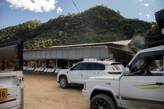 A random roadside restaurant and parking area in the hills of NE India, Mizoram. Travelers stopping for food.