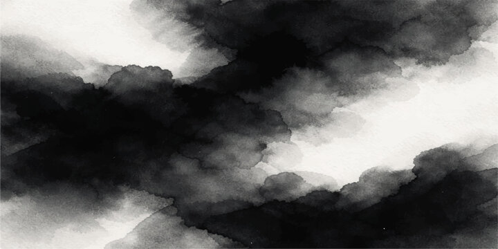 Dramatic dark storm clouds gather in a gray overcast sky as a powerful thunderstorm brings a moody nature background to the blue cloudscape