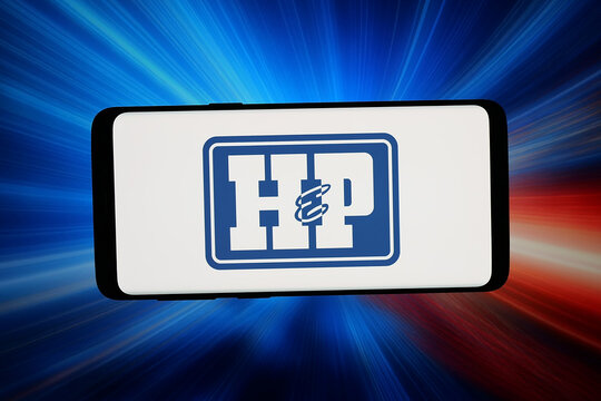 Stuttgart, Germany - 03-20-2026: In this photo illustration, the logo of US oil company Helmerich and Payne Inc. (HP) is displayed on a smartphone in front of abstract background on computer screen.