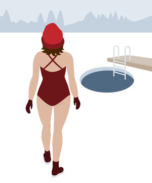 Woman in swimwear walking towards a hole in the ice. Winter swimming.