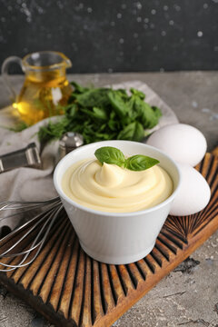 Bowl of fresh mayonnaise on table