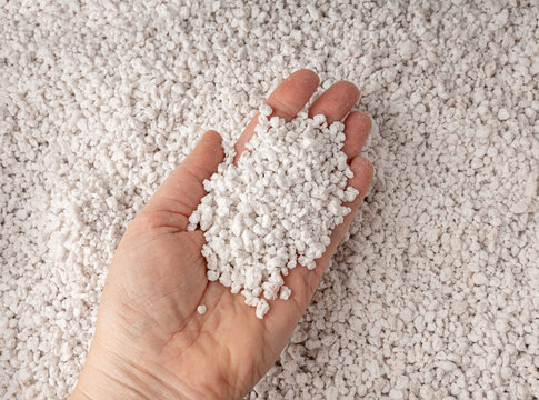 Perlite textured background, crushed amorphous volcanic glass close up