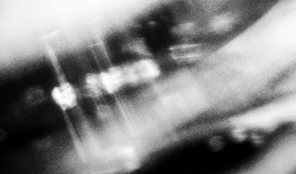 Photocopies of a black and white sheet of paper with a background or texture with grain and noise illustration