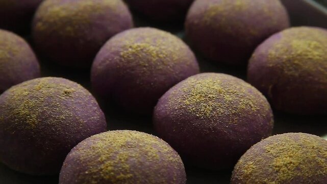 Freshly baked Filipino bread called Ube cheese pandesal