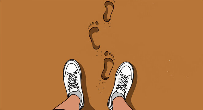 Footprints in the sand leading away from white sneakers