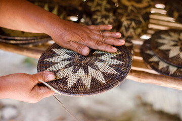 Hands Shaping a Traditional Mangyan Woven Basket Lid