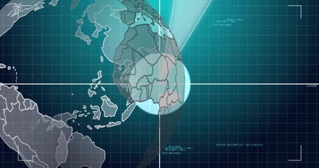 Naklejka premium Rotating translucent globe projection showing Africa coastlines on nav dashboard with crosshair