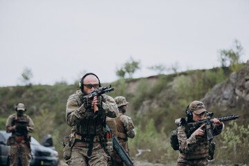 Fototapeta premium Ukrainian military practicing with rifles at the range