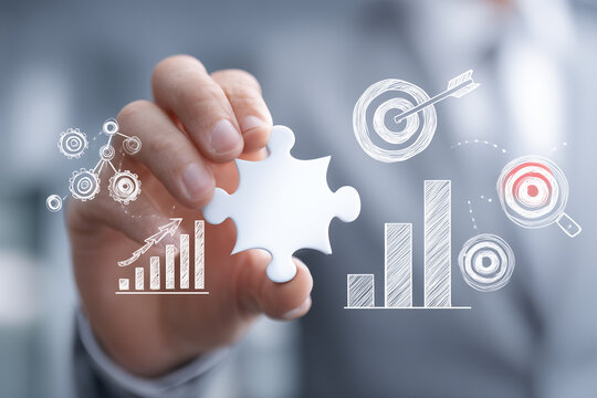 The concept of effective solutions and strategic planning with a close-up of the hands connecting the final puzzle pieces.